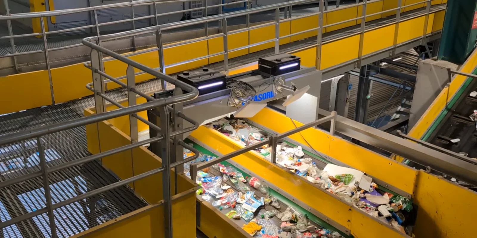 Wasoria Box mounted on a gantry above two sorting conveyors